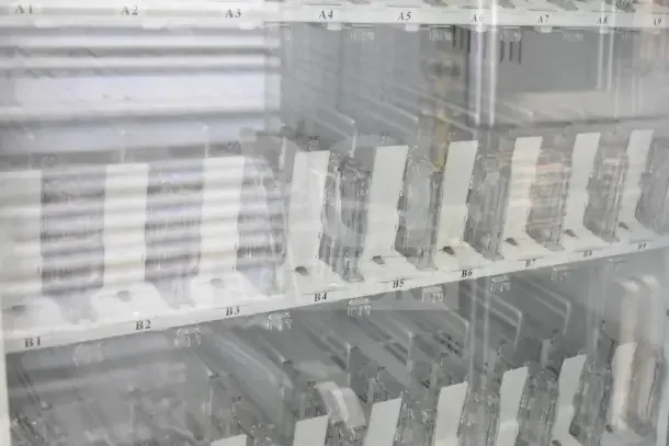 Crane 5800-4HC vending machine, empty display, labeled slots A1-A9, B1-B9. 115V, 1 phase, with bill acceptor.