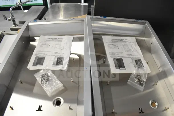 Brand new Xlerator Recess Kit with minor scratches, includes installation instructions and hardware in sealed bags.