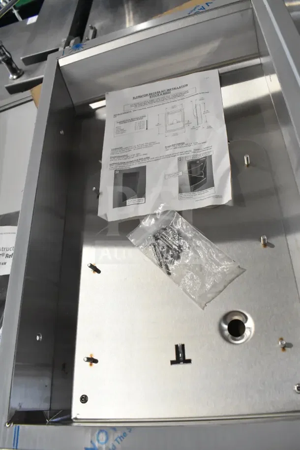 Brand new Xlerator Recess Kit with slight scratches and dents. Includes installation instructions and hardware in a sealed bag.