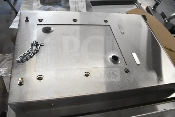 BRAND NEW Xlerator Recess Kit with minor scratches. Stainless steel construction, includes hardware, model markings visible.