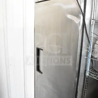 True T-23 Commercial Single Door Reach-In Cooler, stainless steel, 115 volts, 1 phase, visible True logo and temperature gauge.