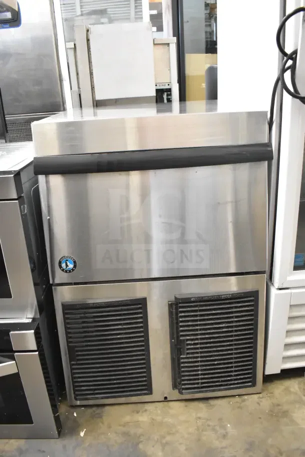 Hoshizaki F-330BAJ flaked ice machine, stainless steel, undercounter design, 115V, self-contained, clean air filter label.
