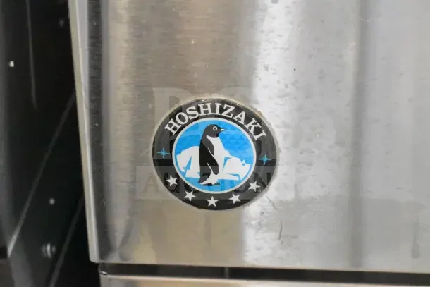 Hoshizaki F-330BAJ undercounter flaked ice machine, stainless steel, 115V, 1 phase. Penguin logo visible.