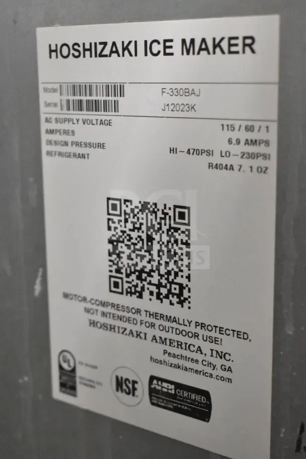 Hoshizaki F-330BAJ undercounter ice machine with model and serial numbers visible on label. 115 Volts, 1 Phase.