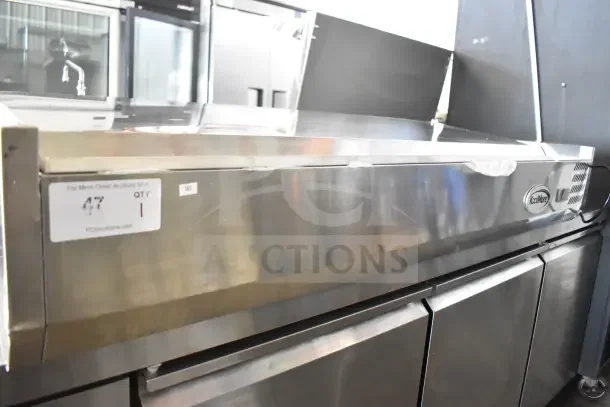 KoolMore SCDC-6P-SSL six pan refrigerated countertop condiment prep station, brand new, scratch and dent. 115V, 1 Phase.