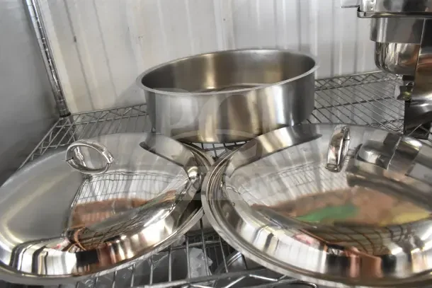 Acopa 922EC14WP round water pan with lid, stainless steel, shiny finish, in excellent condition on metal shelf.