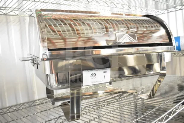 Stainless steel countertop roll top chafing dish, excellent condition, with a sleek design. Auction tag reads "49 QTY 1."