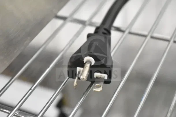 Close-up of a power cord plug for the 2025 Avantco 177IWC35 Countertop Wok Induction Range. 208-240 Volts, 1 Phase.