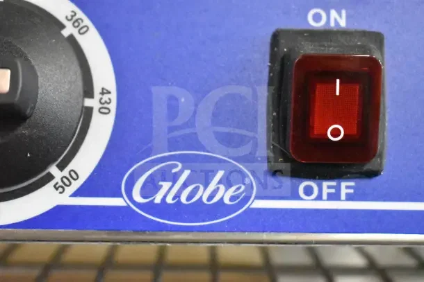 Globe GSGDUE10 Bistro Series Sandwich Grill control with power switch and temperature dial, displaying brand logo.
