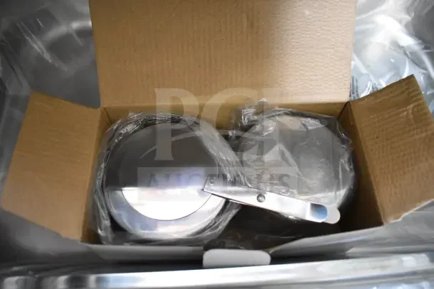 Countertop Roll Top Chafer in box, stainless steel, new condition, plastic-wrapped lids and handles visible.
