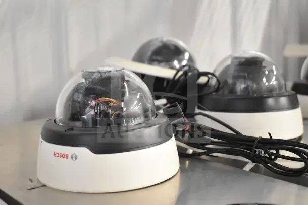 8 Bosch Flexidome IP Indoor 5000 HD security cameras; dome design, model HD, includes wiring, excellent condition.