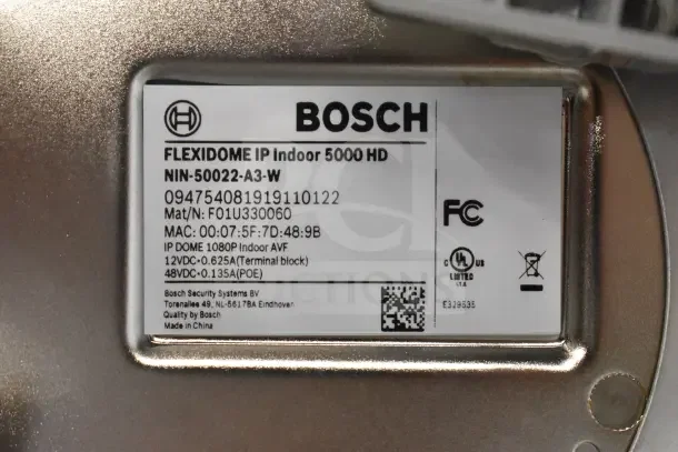 Label on Bosch Flexidome IP Indoor 5000 HD security camera, model NIN-50022-A3-W, showing specifications and certifications.