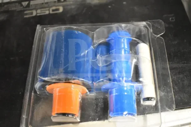 Plastic-wrapped Fargo DTC color ribbon with blue and orange cores, part of a lot including QSC GX5 Power Amplifier.