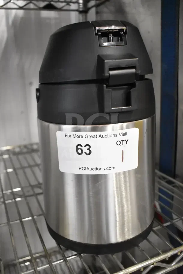 Acopa Air Pot with stainless steel body and black lid, good condition. Label showing auction ID 63.