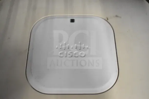 6 Cisco AIR-CAP3502I-A-K9 Dual Band Access Points, gently used, white, features Cisco logo, Wi-Fi capability.