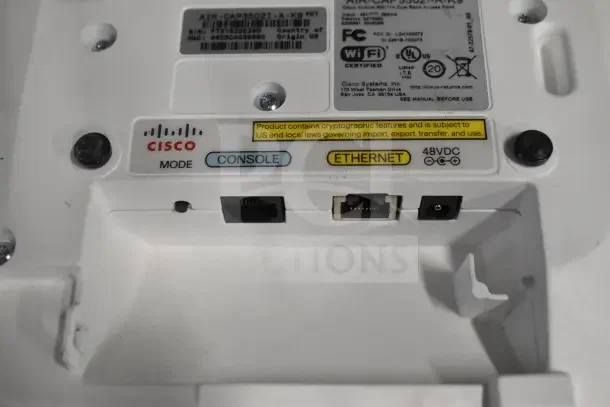 Cisco AIR-CAP3502I-A-K9 dual-band access point, console and Ethernet ports visible, includes cryptographic features warning.