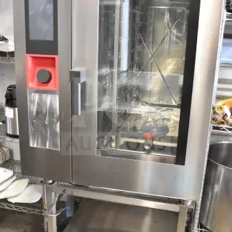 Bakers Pride AETG101R Stainless Steel Commercial Natural Gas Powered Combi Convection Oven on Equipment Stand.