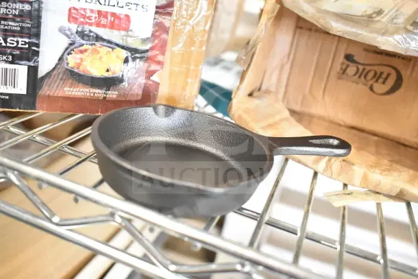 Valor Round Mini Skillet on a metal shelf; new condition, cast iron, ideal for small portions or appetizers. Packaging visible.