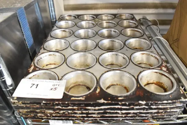 5 metal 24-cup muffin baking pans, stacked, showing some rust and wear. Tag indicates quantity 5 times your bid.