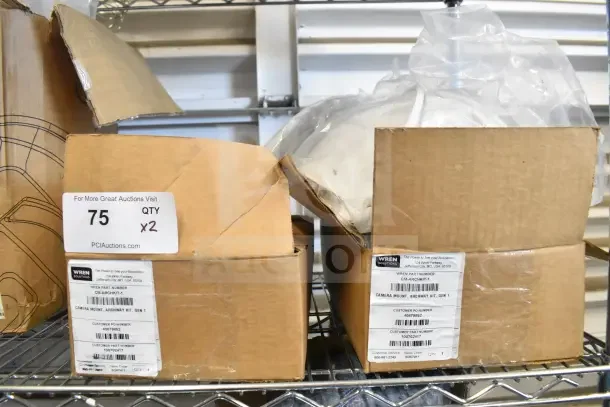 2 boxes of Wren camera mounts, model CM-ARCHKIT-1, Archway Kit Gen 1, in original packaging, label shows product details.