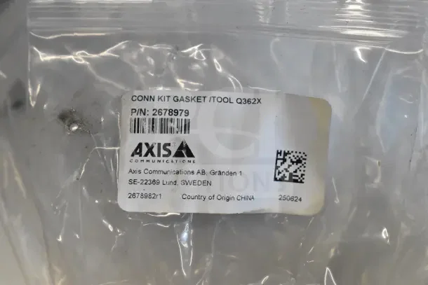 Two boxes of Wren camera mounts in original packaging. Axis Communications label indicates part number 2678979, made in China.