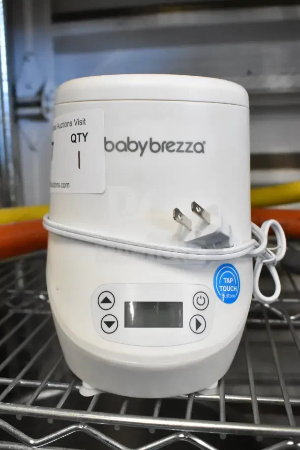 Baby Brezza BZ0105 Bottle Warmer, countertop model, 120V, 1 Phase, with digital display and tap touch buttons.