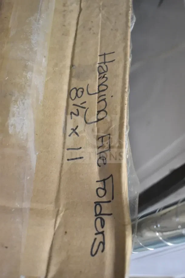 Box of 8 1/2 x 11 hanging file folders. Brown box labeled with item description. Condition appears intact.