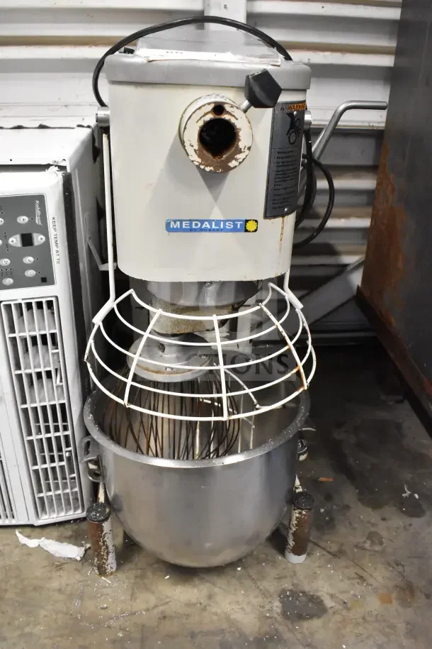 Hobart Medalist commercial dough mixer, features bowl, bowl guard, whisk attachment, 115 volts, 1 phase.