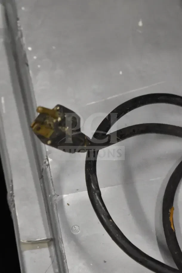 "Hobart Medalist commercial dough mixer cable and plug, showing signs of wear, suitable for 115 volts, 1 phase power."