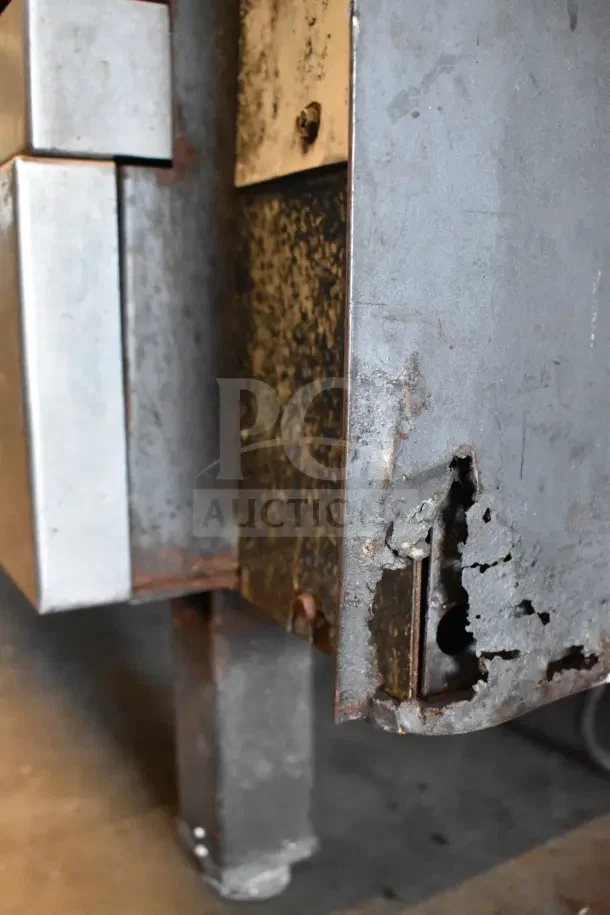 Vulcan convection oven corner with visible rust and wear, emphasizing condition.