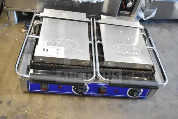 Globe GPGDUE10 Commercial Double Panini Press, 240V, 1 Phase, sturdy build, used condition, visible Globe logo.