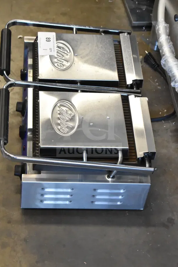2025 Globe GPGDUE10 commercial double panini press, stainless steel, 240 volts, 1 phase, lightly used condition.