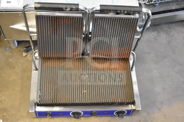 2025 Globe GPGDUE10 commercial countertop double panini press, 240 volts, 1 phase, showing used condition with visible wear.