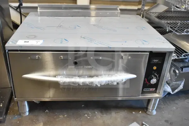 Brand new ServIt 423WDSFS1 single freestanding drawer warmer with scratch and dent, 120V, 1 phase. Protective film intact.