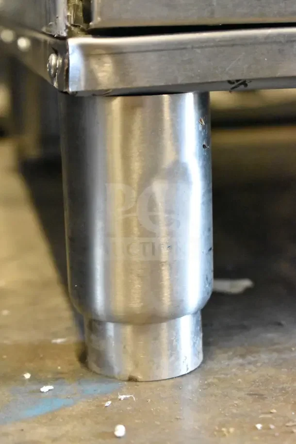 Brand new ServIt 423WDSFS1 freestanding drawer warmer leg, showing stainless steel finish with minor scratches.