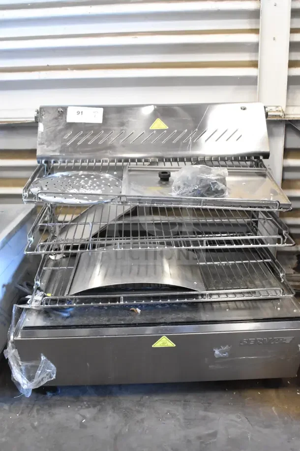 Brand new ServIt 423HDM26SA 26" heated display case, 3 shelves, sliding doors, 120V, with glass damage.