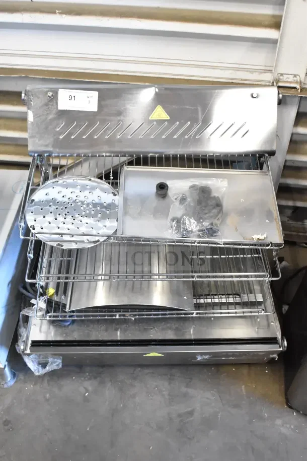 BRAND NEW ServIt 423HDM26SA 26" heated display case, 3 shelves, sliding doors, minor glass damage visible. 120V, 1 Phase.