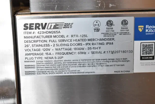 Brand new ServIt 423HDM26SA, 26" heated display case, glass damage noted, 120V, stainless, 3 shelves, sliding doors.