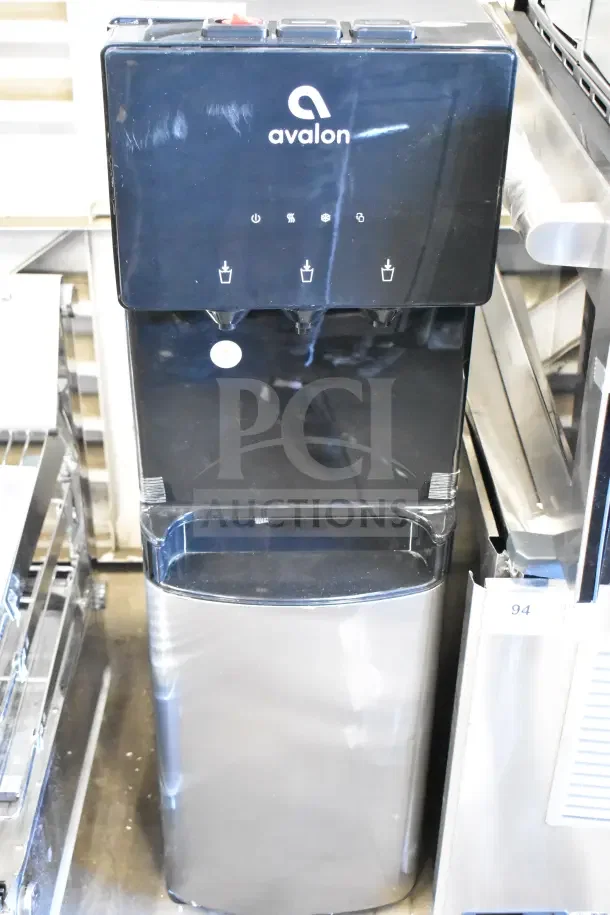 Avalon A4BLWTRCLR water dispenser, black and silver, 115 volts, 1 phase, three dispensing buttons, good condition.