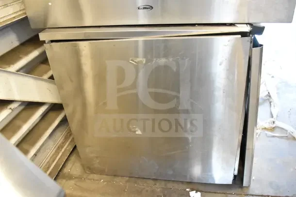 Scotsman NH0622A-1B Commercial Ice Machine, 644 lb. capacity, visible wear on stainless steel exterior, 115V, 1 Phase.