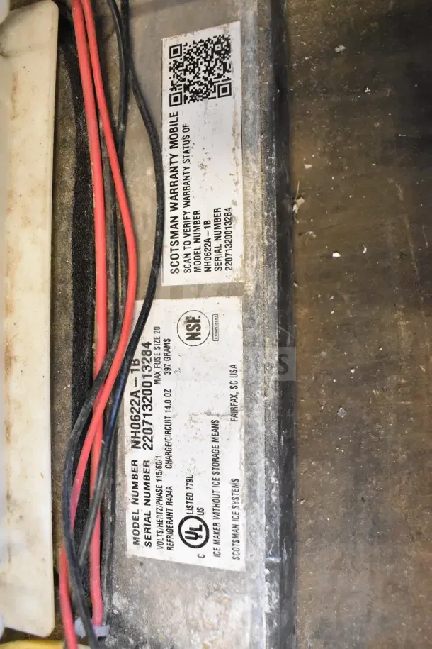 Scotsman NH0622A-1B ice machine label shows model, serial number, voltage 115, 1 phase, NSF listed, for warranty and specs check.