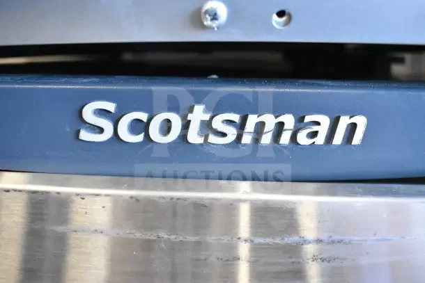 Scotsman NH0622A-1B Commercial Ice Machine, hard nugget, 644 lb capacity, 115 Volts. Close-up of logo detail.