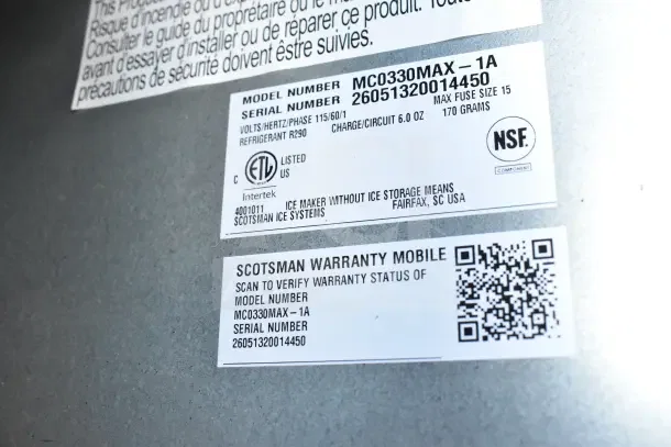 BRAND NEW Scotsman MC0330MAX-1A ice machine label showing model, serial number, and warranty QR code.