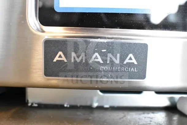 Brand new Amana RCS10TS commercial countertop microwave. Scratch and dent, 120 volts, 1 phase. Front Amana logo visible.