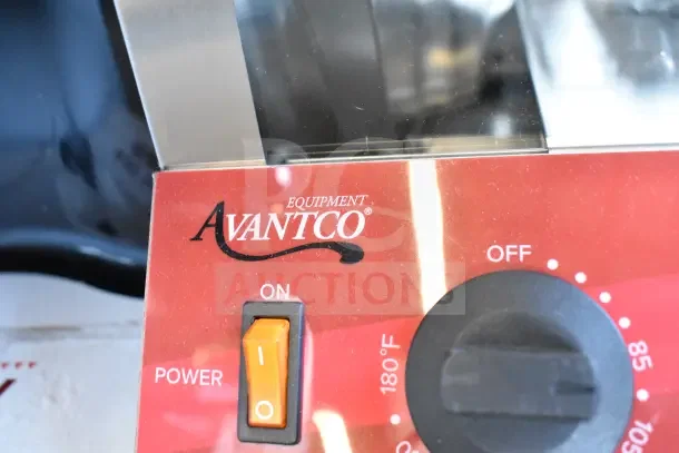 Brand new Avantco countertop hot dog merchandiser control panel with power switch and temperature dial.