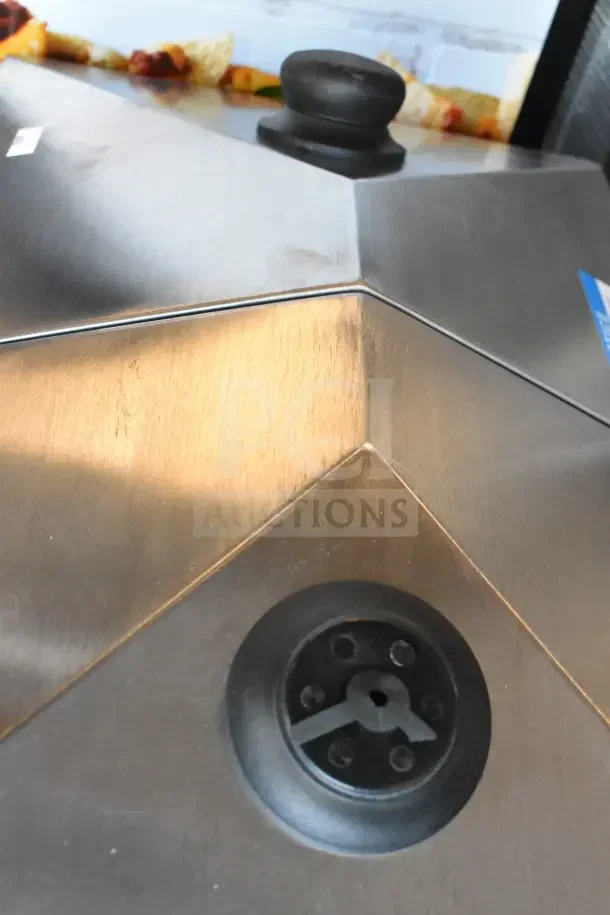 Brand new Avantco countertop hot dog merchandiser, scratch and dent condition, stainless steel with control knob.