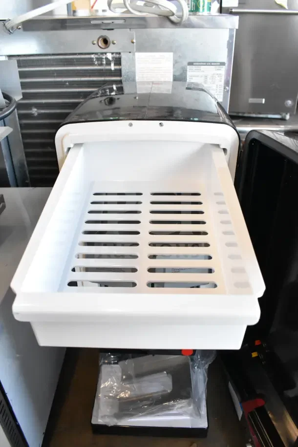 Brand new Carnival King 382CD225 cheese sauce dispenser, 120 volts, 1 phase, with scratch and dent condition, white tray visible.
