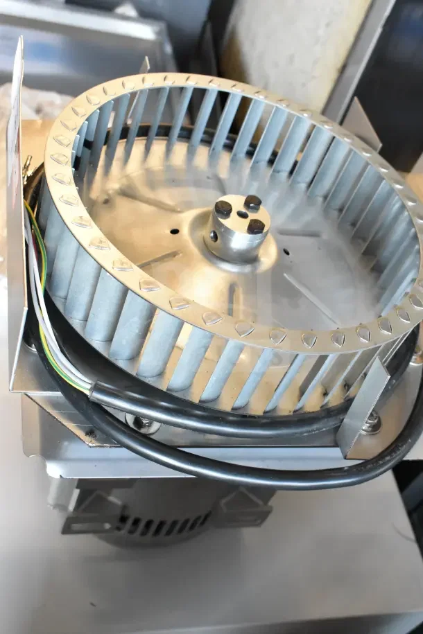 BRAND NEW 2025 Nidec Convection Oven, 115-120V, 1 Phase. Scratch and dent condition. Image shows oven fan and wiring.