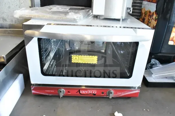Brand new Avantco 177CO16 half-size countertop convection oven, 1.5 cu. ft., 120V, visible scratch and dent.