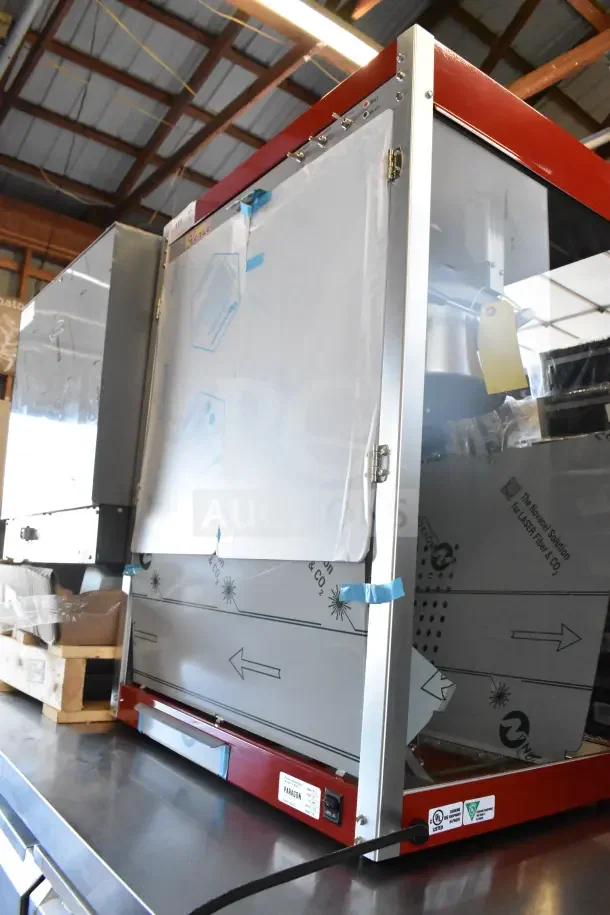 Brand new Paragon 198116 Venue Pop 16 oz. red countertop popcorn machine with minor scratches, 120 volts, 1 phase.